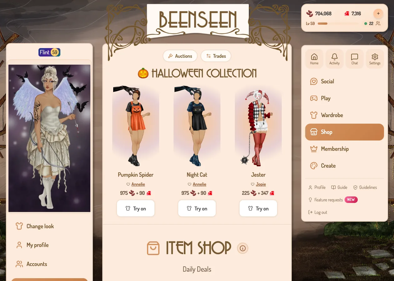 The BeenSeen shop showing the Halloween collection: a pumpkin pinafore, a black cat dress and a harlequin jester outfit
